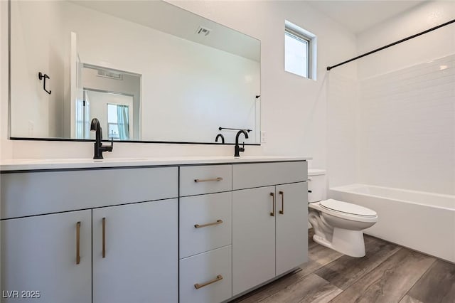 1213 Granite Falls Pl, North Las Vegas, NV 89084 - bathroom with double vanity, wood finished floors, and tub / shower combination