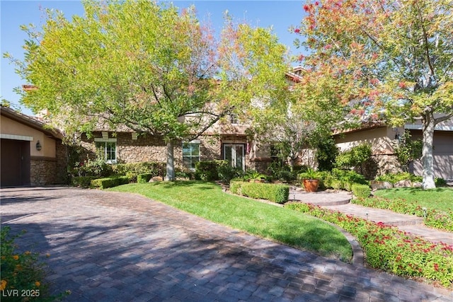 2285 Villefort Ct, Las Vegas, NV 89117 - view of property hidden behind natural elements with stone siding and a front lawn