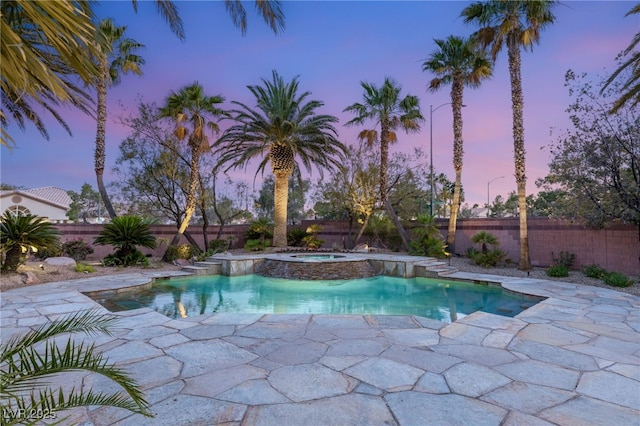 2285 Villefort Ct, Las Vegas, NV 89117 - view of pool featuring an in-ground hot tub, a fenced backyard, and a patio area