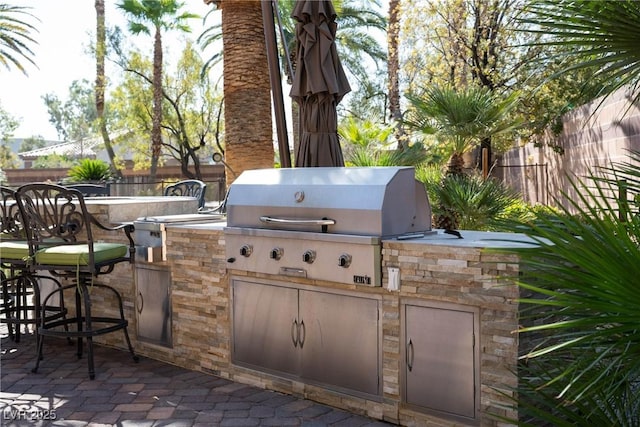2285 Villefort Ct, Las Vegas, NV 89117 - view of patio / terrace with area for grilling and a bar