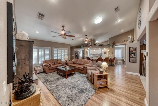 4045 N Chieftain St, Las Vegas, NV 89129 - living area featuring a ceiling fan, light wood-style flooring, vaulted ceiling, and recessed lighting