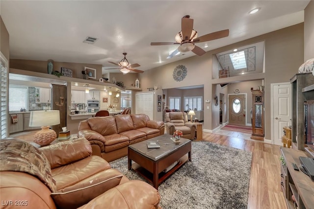 4045 N Chieftain St, Las Vegas, NV 89129 - living room featuring a ceiling fan, light wood-type flooring, recessed lighting, and a high ceiling