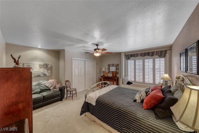 4045 N Chieftain St, Las Vegas, NV 89129 - carpeted bedroom featuring a closet, a ceiling fan, and a textured ceiling