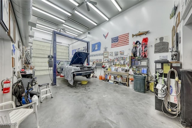 4045 N Chieftain St, Las Vegas, NV 89129 - garage featuring a workshop area and a ceiling fan