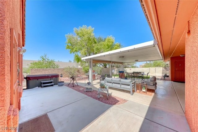 4045 N Chieftain St, Las Vegas, NV 89129 - fenced backyard featuring a hot tub, a patio, and outdoor dining area