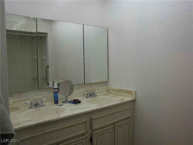 4950 Burnham Ave, Las Vegas, NV 89119 - full bath featuring double vanity and tiled shower