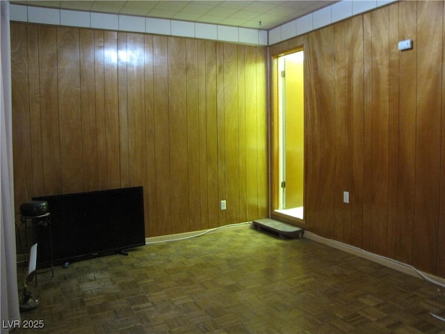 4950 Burnham Ave, Las Vegas, NV 89119 - spare room featuring wooden walls