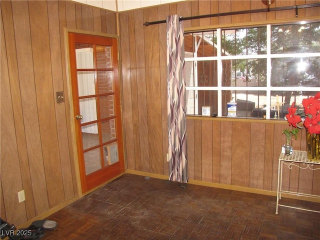 4950 Burnham Ave, Las Vegas, NV 89119 - spare room featuring wood walls and baseboards