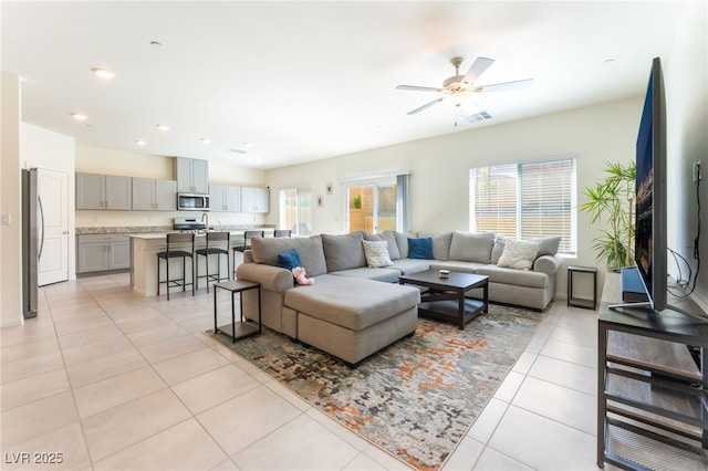 7211 Alabaster Peak St, Las Vegas, NV 89166 - living room featuring a ceiling fan, light tile patterned floors, and recessed lighting