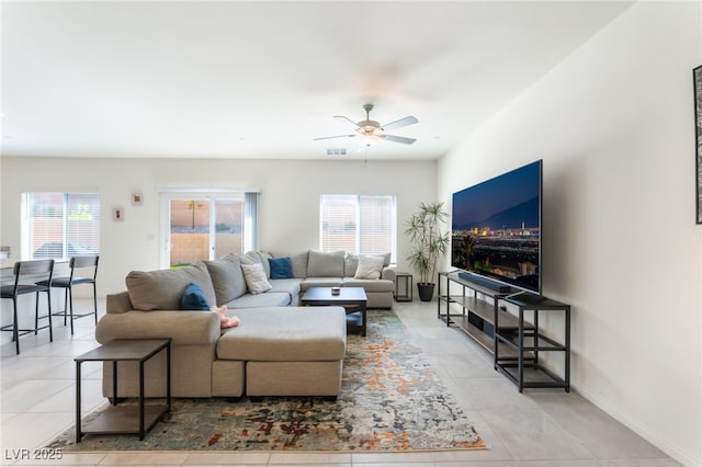 7211 Alabaster Peak St, Las Vegas, NV 89166 - living area with a ceiling fan and tile patterned flooring