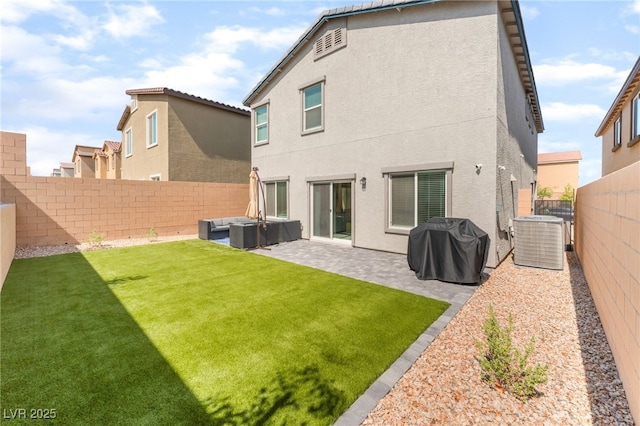 7211 Alabaster Peak St, Las Vegas, NV 89166 - rear view of property with a fenced backyard, stucco siding, an outdoor living space, and a patio