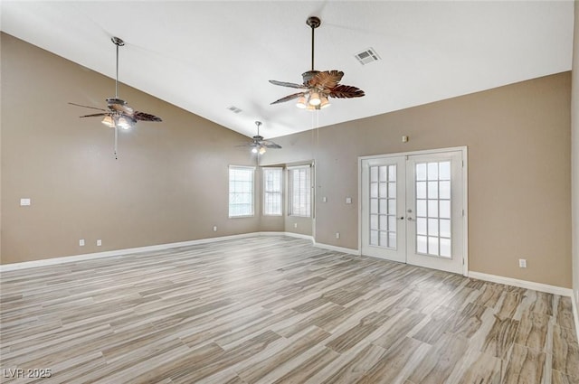 819 Sandsprings St, Henderson, NV 89011 - spare room featuring ceiling fan, light wood-style floors, french doors, and high vaulted ceiling