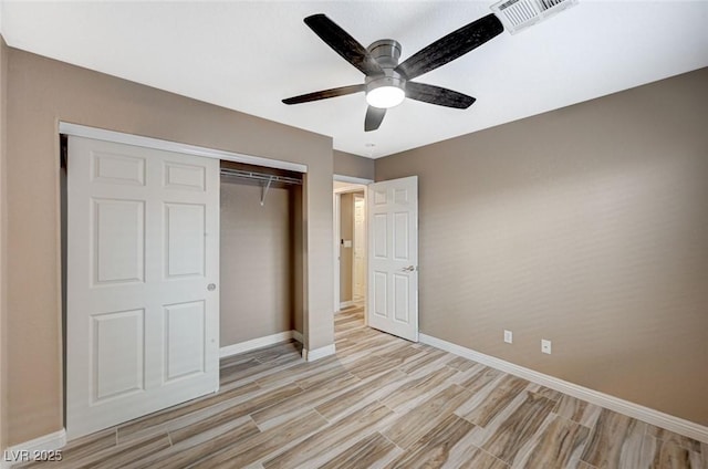 819 Sandsprings St, Henderson, NV 89011 - unfurnished bedroom featuring light wood-style floors, a closet, and ceiling fan