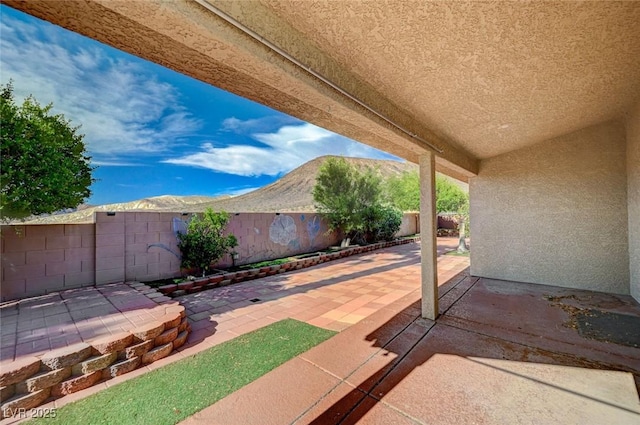 819 Sandsprings St, Henderson, NV 89011 - fenced backyard with a patio area