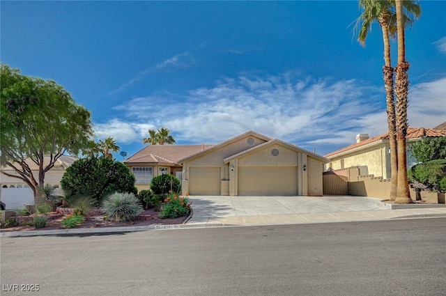 819 Sandsprings St, Henderson, NV 89011 - ranch-style home with a garage, concrete driveway, stucco siding, and a gate