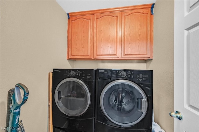 3591 Gloucester Gate St, Las Vegas, NV 89122 - laundry room with independent washer and dryer and cabinet space
