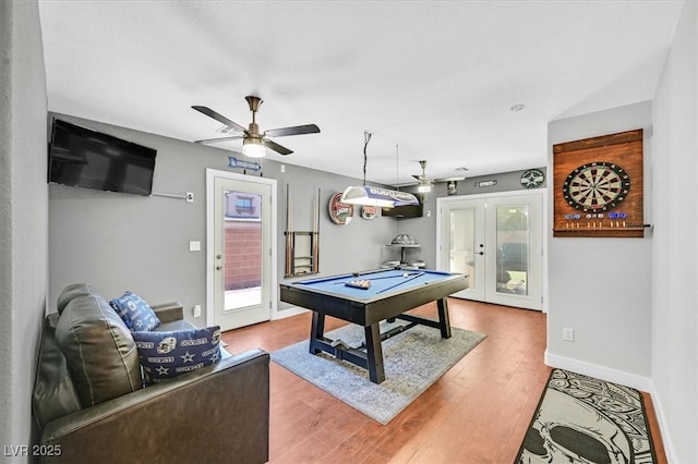 3591 Gloucester Gate St, Las Vegas, NV 89122 - game room with french doors, billiards, ceiling fan, and light wood-style flooring