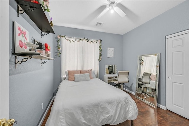 3591 Gloucester Gate St, Las Vegas, NV 89122 - bedroom with dark wood-style floors and ceiling fan