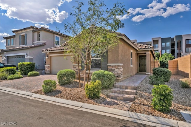 8346 Vinamala Ave, Las Vegas, NV 89149 - view of front of home with stucco siding, a tile roof, and stone siding