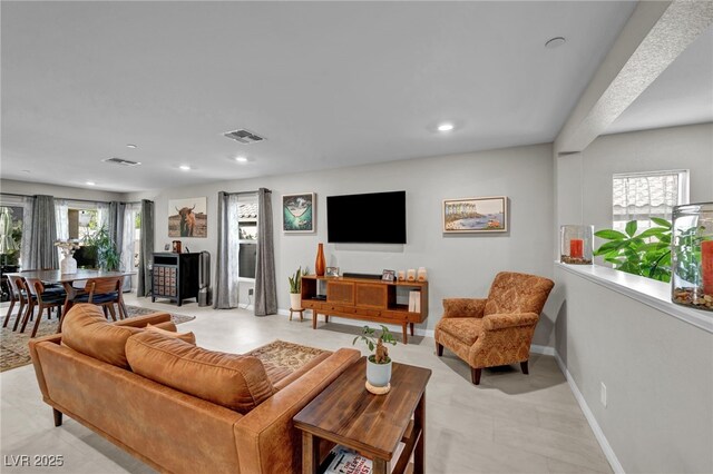 8346 Vinamala Ave, Las Vegas, NV 89149 - living area featuring plenty of natural light and recessed lighting