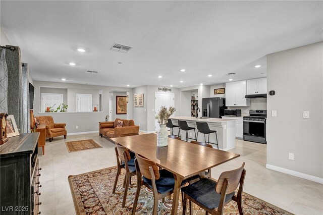 8346 Vinamala Ave, Las Vegas, NV 89149 - dining space featuring recessed lighting and baseboards