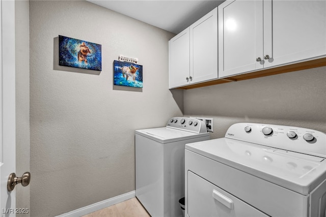 8346 Vinamala Ave, Las Vegas, NV 89149 - laundry area with washing machine and clothes dryer, cabinet space, and a textured wall