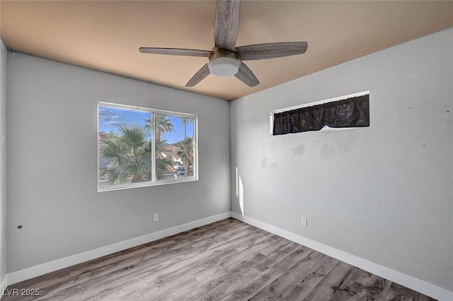 5823 Rose Sage St, North Las Vegas, NV 89031 - unfurnished room featuring a ceiling fan and wood finished floors