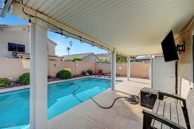 5823 Rose Sage St, North Las Vegas, NV 89031 - view of swimming pool featuring a patio area and a fenced backyard