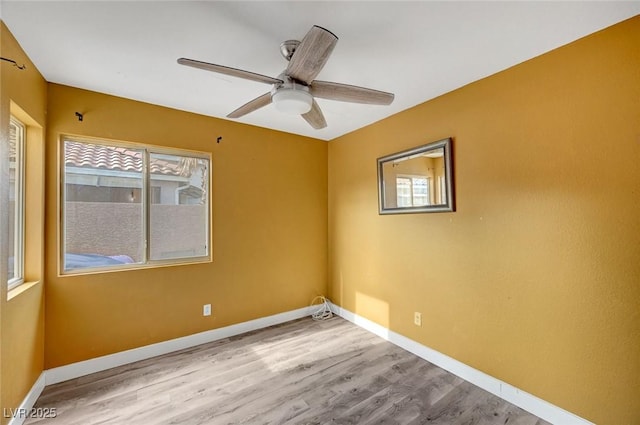 5823 Rose Sage St, North Las Vegas, NV 89031 - empty room featuring wood finished floors and ceiling fan