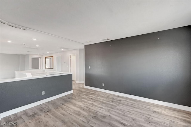 5823 Rose Sage St, North Las Vegas, NV 89031 - unfurnished room with light wood-style flooring and recessed lighting
