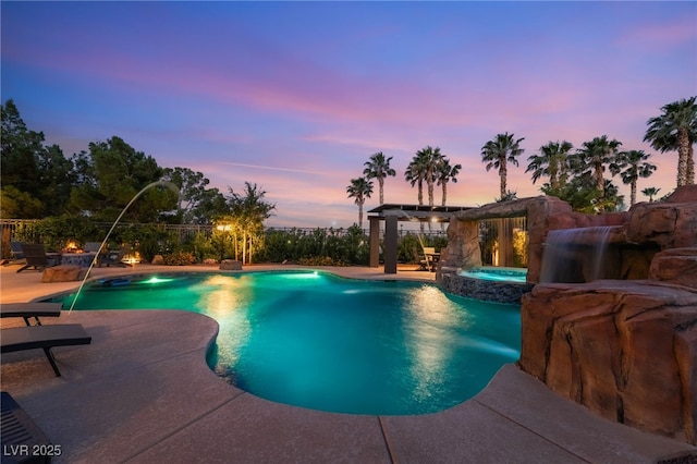 352 Angels Trace Ct, Las Vegas, NV 89148 - view of pool featuring an outdoor fire pit, a patio area, and a pool with connected hot tub