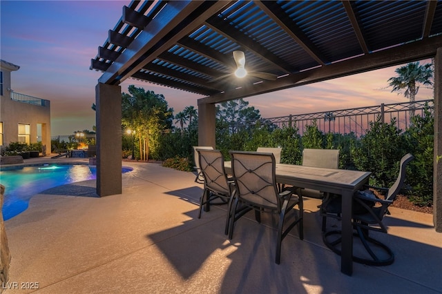 352 Angels Trace Ct, Las Vegas, NV 89148 - patio terrace at dusk with a patio, a pergola, and outdoor dining space