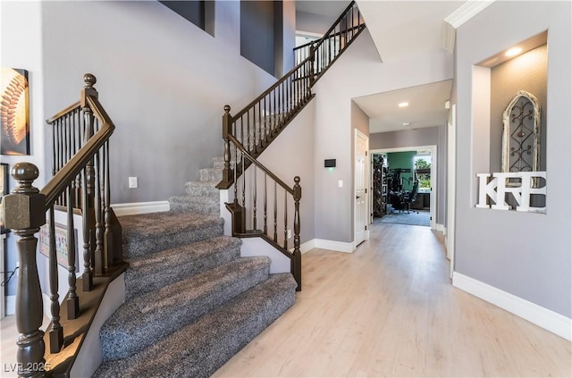 352 Angels Trace Ct, Las Vegas, NV 89148 - stairs featuring wood finished floors and baseboards