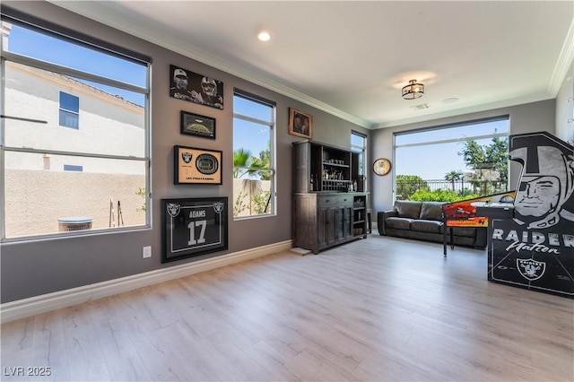 352 Angels Trace Ct, Las Vegas, NV 89148 - living room featuring crown molding, wood finished floors, and recessed lighting