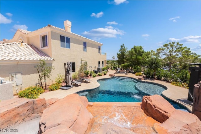 352 Angels Trace Ct, Las Vegas, NV 89148 - view of swimming pool featuring a patio area