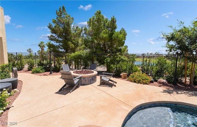 352 Angels Trace Ct, Las Vegas, NV 89148 - view of patio / terrace with an outdoor fire pit