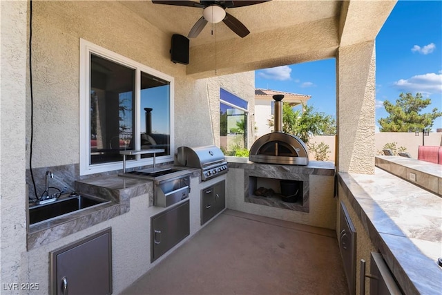 352 Angels Trace Ct, Las Vegas, NV 89148 - view of patio featuring an outdoor kitchen and a ceiling fan