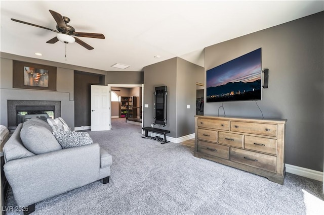352 Angels Trace Ct, Las Vegas, NV 89148 - living area with ceiling fan, carpet flooring, recessed lighting, and a glass covered fireplace