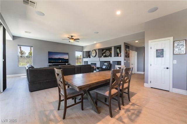 352 Angels Trace Ct, Las Vegas, NV 89148 - dining room with plenty of natural light, light wood-style flooring, ceiling fan, and recessed lighting