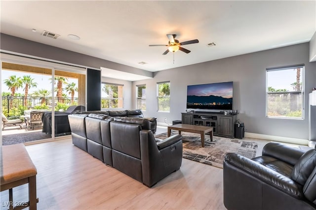 352 Angels Trace Ct, Las Vegas, NV 89148 - living area with ceiling fan and light wood finished floors