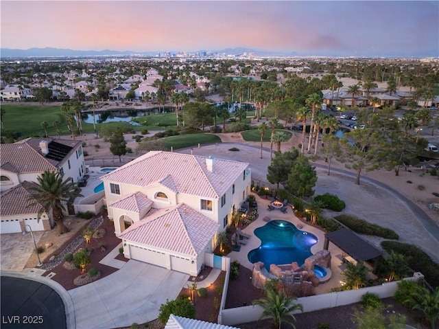 352 Angels Trace Ct, Las Vegas, NV 89148 - aerial perspective of suburban area with a pool area and a large body of water