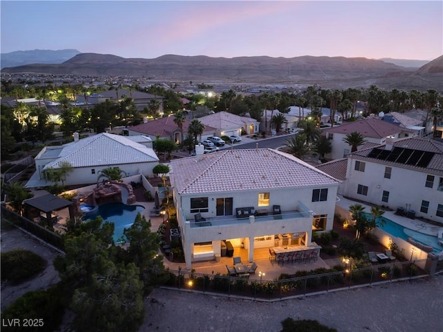 352 Angels Trace Ct, Las Vegas, NV 89148 - aerial perspective of suburban area featuring a mountain backdrop and a pool
