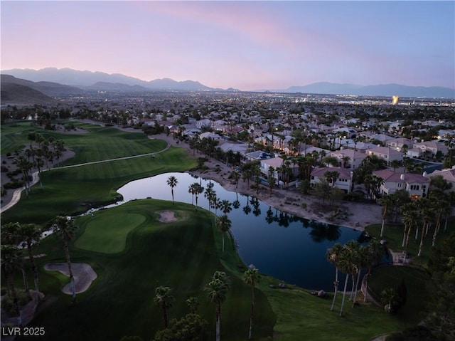 352 Angels Trace Ct, Las Vegas, NV 89148 - aerial overview of property's location featuring a water and mountain view, nearby suburban area, and a local golf course