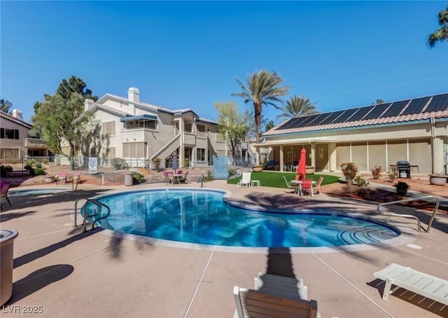 3425 E Russell Rd Unit 265, Las Vegas, NV 89120 - community pool featuring a patio area