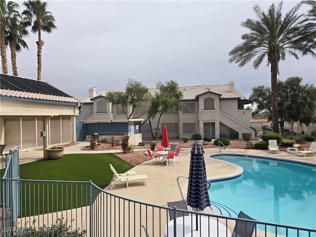 3425 E Russell Rd Unit 265, Las Vegas, NV 89120 - community pool with a patio and stairs