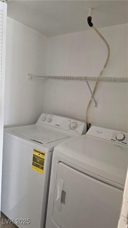 3425 E Russell Rd Unit 265, Las Vegas, NV 89120 - laundry area with washer and clothes dryer