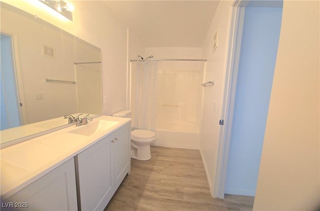3425 E Russell Rd Unit 265, Las Vegas, NV 89120 - bathroom with vanity, wood finished floors, and shower / tub combination