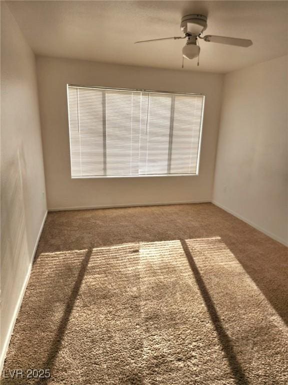 3425 E Russell Rd Unit 265, Las Vegas, NV 89120 - spare room with carpet floors and a ceiling fan