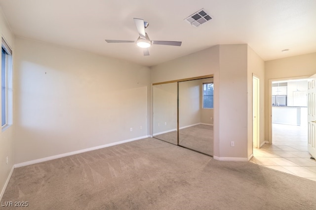 10300 Wellside Hill Ave, Las Vegas, NV 89145 - unfurnished bedroom featuring carpet floors, a closet, fridge, and ceiling fan
