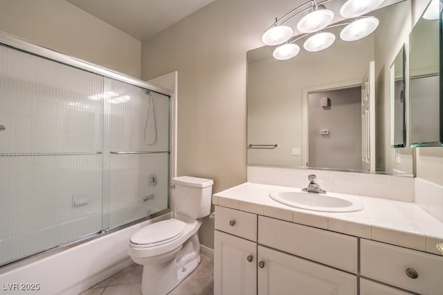 10300 Wellside Hill Ave, Las Vegas, NV 89145 - bathroom featuring vanity, enclosed tub / shower combo, and tile patterned floors